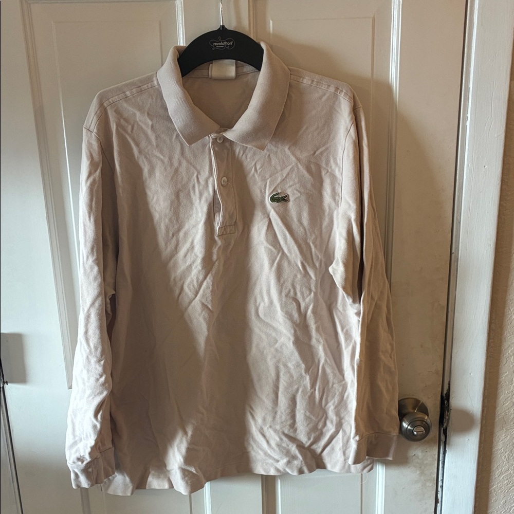 Lacoste Men's Cream Long Sleeve Polo fits like a large